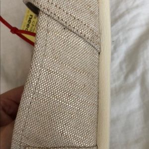 Brand new TOMS shoes. Size 9.